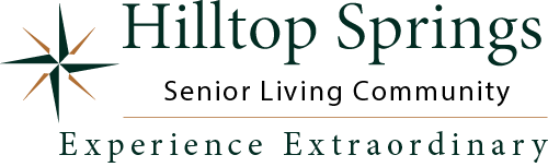 Logo of Hilltop Springs Senior Living Community with a star emblem. Text reads: “Experience Extraordinary.”.