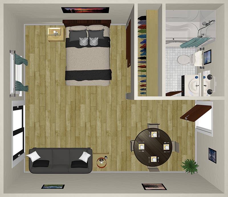 A top-down view of a furnished room with a bed, nightstand, and closet on one side. Opposite is a sofa and a small dining table with four chairs. A bathroom with a shower and sink is in the corner. The room features wood flooring and a few artworks.